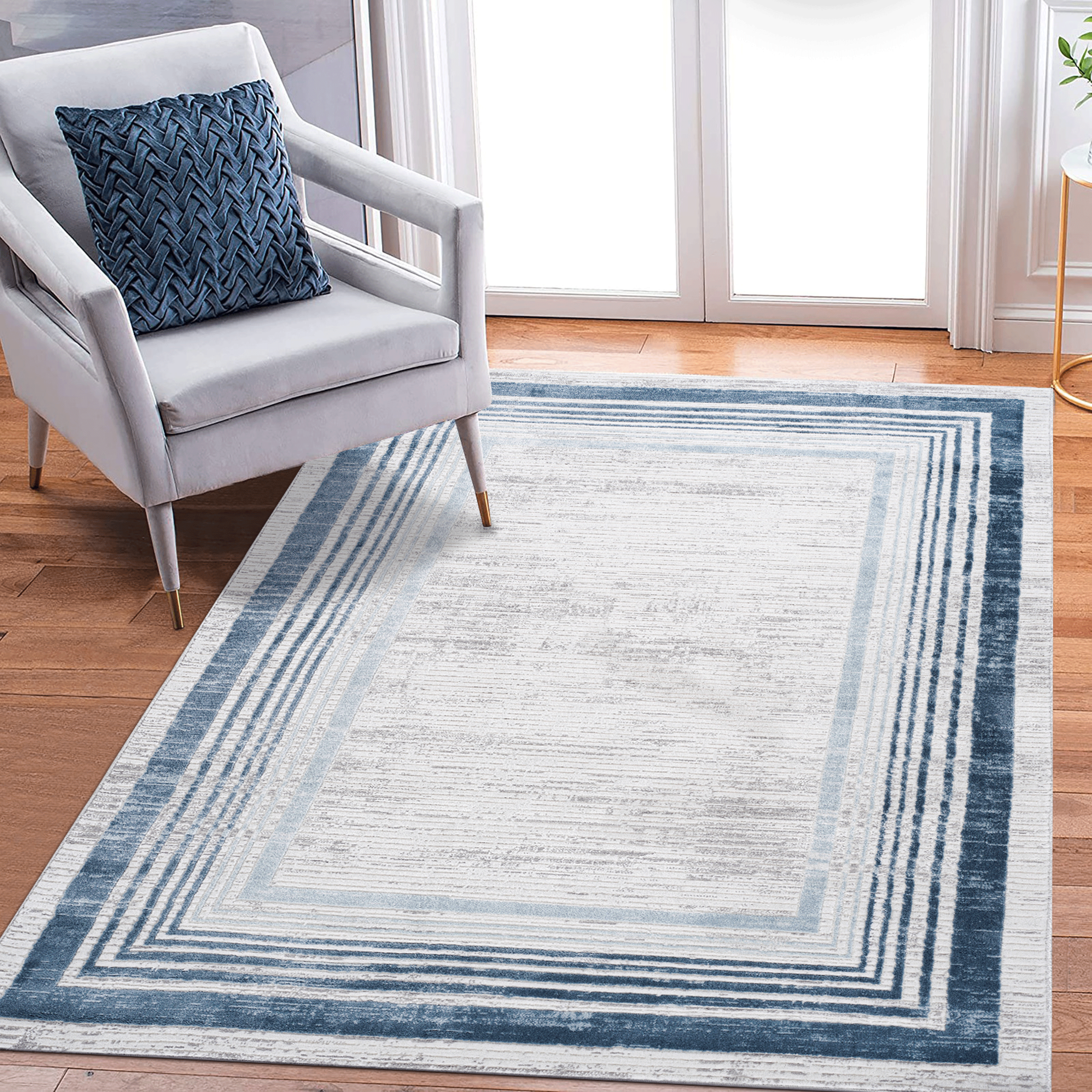 5X7 Blue/Ivory/Bordered Non-Shedding and Stain Resistant Area Rug