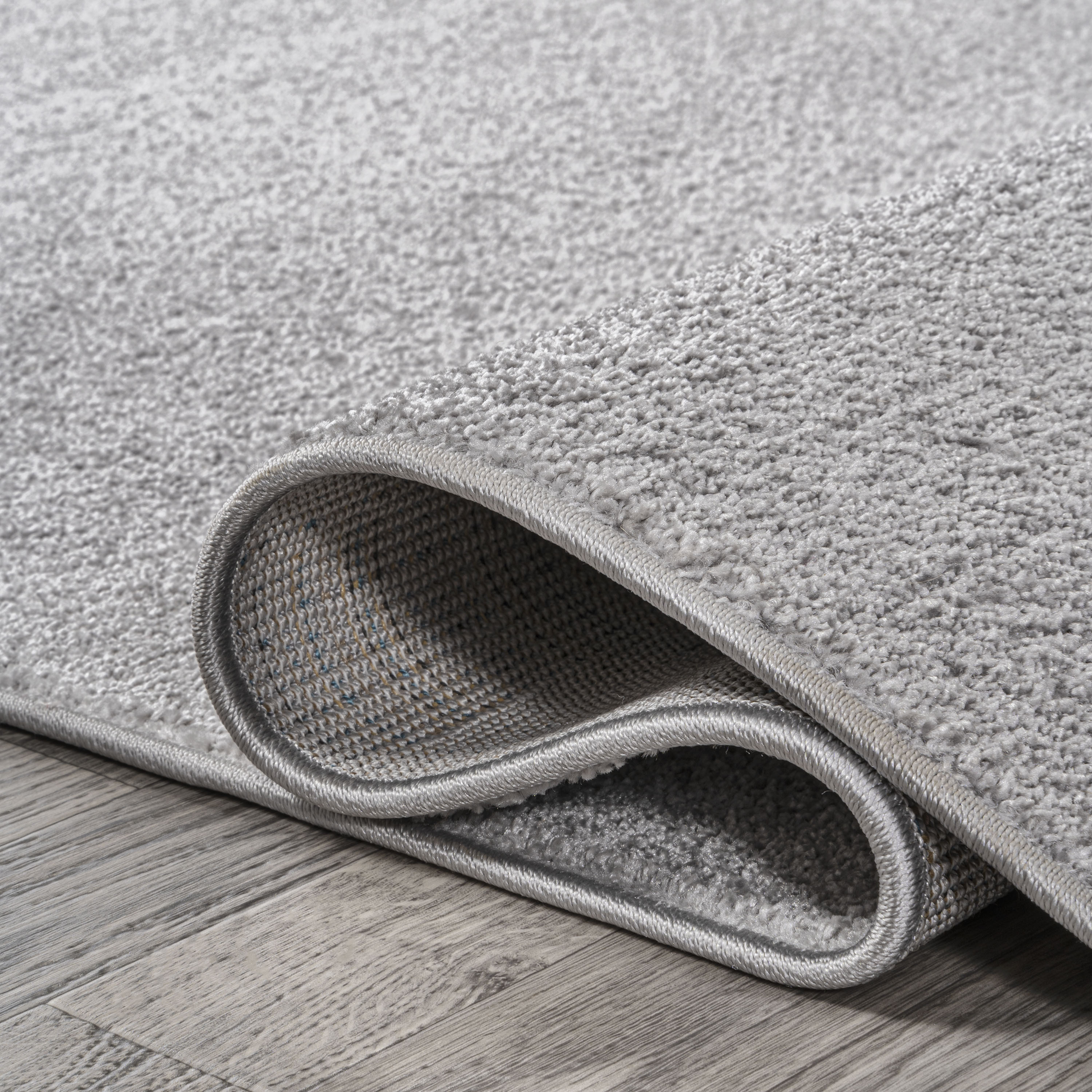 Haze Solid Sleek Low-Pile Round Area Rug